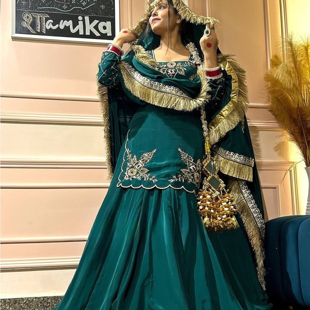 Elegant Teal Embroidered Gown with Gold Accents